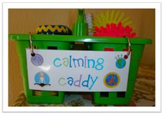 a green basket with a sign that says calming caddy