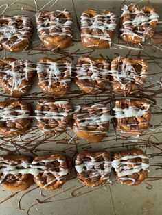 chocolate covered pretzels with white icing and drizzled on them