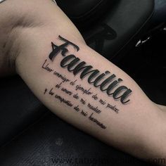 a person with a tattoo on their arm that reads, familiaa and the words are written in cursive font