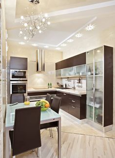 a dining room table and chairs in a kitchen