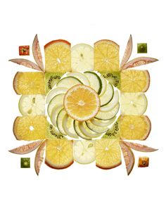 an arrangement of sliced fruit arranged in a circle