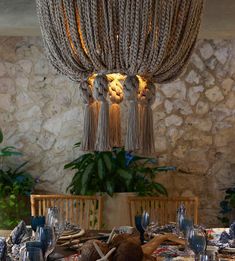 a dining room table is set with plates and silverware