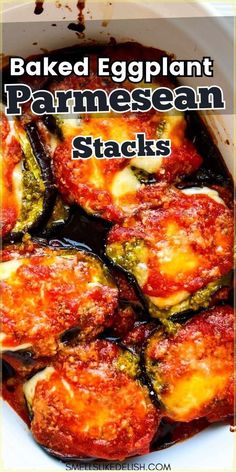 baked eggplant parmesan stacks in a white casserole dish with text overlay