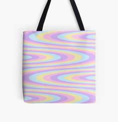 a colorful tote bag with an abstract design