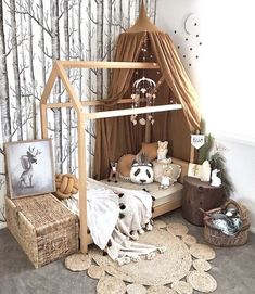 a child's bedroom decorated in neutral tones