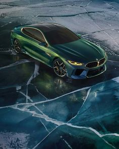 the new bmw concept car is shown in an artistic rendering style, with ice on the ground