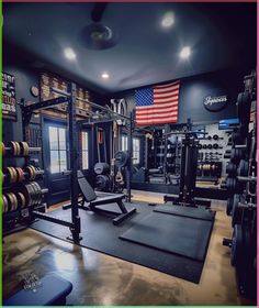 a home gym with an american flag on the wall