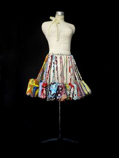 a mannequin is dressed in colorful clothing