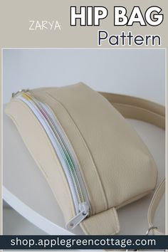 a white purse with zippers on it and the words zara hip bag pattern