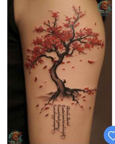 a woman's thigh with a tree and quote on the back of her leg