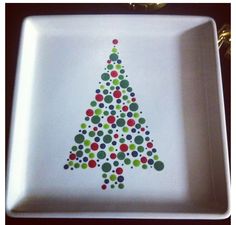 a white plate with a christmas tree on it