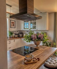 a kitchen with an oven, stove and counter top in it's center island