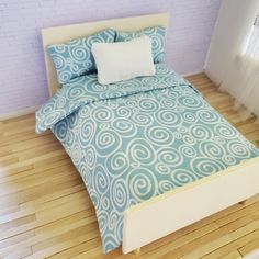 a blue and white bed in a room