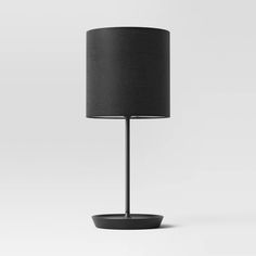 a black lamp on a white background