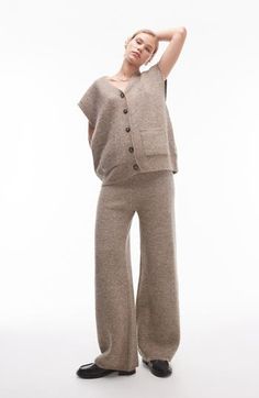 Get extra cozy for the cooler seasons in these wool-kissed sweater-knit pants cast in a calming, earthy hue. 33" inseam; 23" leg opening; 12" front rise; 14" back rise (size Medium) Elastic waist 64% polyester, 14% acrylic, 14% nylon, 5% wool, 3% elastane Hand wash, dry flat Imported Cozy Cashmere Bottoms For Winter, Relaxed Fit Wool Bottoms For Fall, Casual Wool Pants For Loungewear, Relaxed Fit Wool Pants For Fall, Cozy Cashmere Bottoms For Fall, Wool Wide Leg Pants For Loungewear, Beige Knit Bottoms For Fall, Cozy Wide Leg Bottoms For Fall, Cozy Fall Bottoms With Pockets