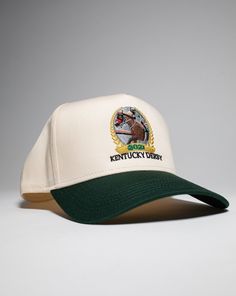 Pirate Kentucky Derby Churchill Downs Hat Size: Adjustable Vintage Snapback Cap Color: Cream/Green Front Kentucky Derby Design Embroidery Stitch Count: 24,517 Embroidery Color: Grey, Yellow, Brown, Black, Orange, Red Vintage Snapback Cap, Beige Hat With Embroidered Logo And Short Brim, Cream Cap With Embroidered Logo, Adjustable Cream Hat With Embroidered Logo, Embroidered Cream Cap, Cream Embroidered Cap, Cream Hat With Embroidered Logo, One Size Fits Most, Vintage Hat, Urban Cowboy Style