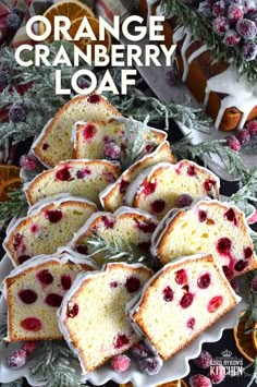 orange cranberry loaf with icing on a plate