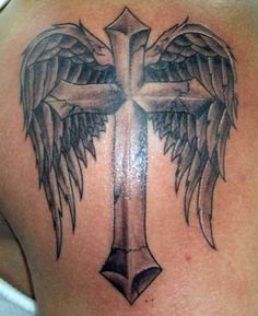 the back of a woman's shoulder with angel wings on it, and an article about