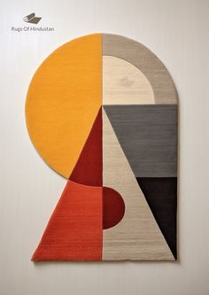 an abstract rug with different colors and shapes