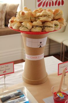 a table topped with lots of pastries on top of a tray