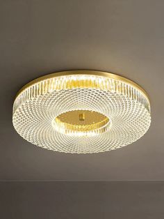 a circular light fixture in a room