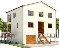 a two story house with stairs leading up to the second floor