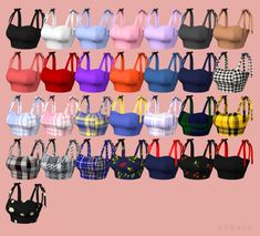 many different colored bras are displayed on a pink background