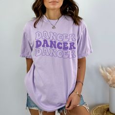 You will love this Comfort Colors retro dancer shirt! It is the perfect trendy dance tee for dancers and dance teachers to wear to dance practice and makes a great gift for dancers! PRODUCTION TIME: 1-3 business days  SHIPPING TIME: 2-5 business days  PRODUCT DESCRIPTION: These ultra soft pigment dyed shirts are one of our best sellers, 100% Cotton. 100% ring spun cotton Preshrunk, soft-washed, garment-dyed fabric Set-in sleeves Double-needle stitched sleeves and bottom hem Twill taped shoulder- Casual Summer T-shirt For Dance, Casual Short Sleeve Dance Tops, Casual Short Sleeve T-shirt For Dance, Casual Short Sleeve Tops For Dance, Casual Crew Neck Shirt For Dance, Hip Hop Dance Tops With Short Sleeves, Casual Dance Shirt With Graphic Print, Hip Hop Style Crew Neck Top For Dance, Casual Graphic Print Shirt For Dance