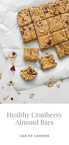 Cranberry almond bars on parchment paper.