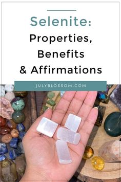 a hand holding three pieces of glass with the words selenite properties, benefits and affirmations