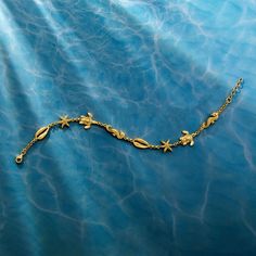 Ross-Simons - 18kt Gold Over Sterling Sea Life Anklet. 10". Here's the perfect beachy accessory. Crafted of textured and polished 18kt yellow gold over sterling silver, this anklet boasts shells, starfish, sea turtles and seahorses. Ideal for all of your summer soirees! Features a 1" extender. Lobster clasp, 18kt gold over sterling sea life anklet. Gold Strand Bracelet With Ocean-inspired Style, Dr Accessories, Turtle Anklet, Beachy Bracelets, Beach Basket, Sea Jewelry, Summer Soiree, Seahorses, Sea Turtles