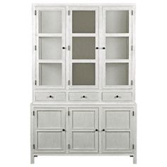 a white china cabinet with glass doors and drawers