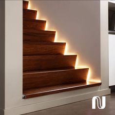 the stairs are illuminated with leds in this modern home