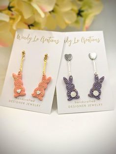 the earrings are designed to look like animals