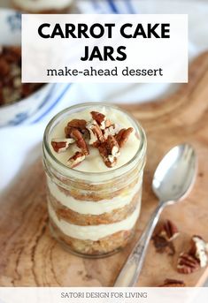 a glass jar filled with dessert sitting on top of a wooden cutting board