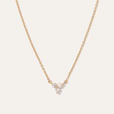 Dainty and perfect for layering, this white sapphire necklace is a perfect daily staple that can be dressed up or down. Gold vermeil is sterling silver layered with a thick layer of 18k gold, which is much higher quality than standard gold plating.  | Quince | Women's White Sapphire Triad Necklace in Gold Vermeil Delicate White Diamond Necklace For Everyday, Quince Necklace, Necklace Gold Simple, White Sapphire Necklace, Gold Necklace Simple, Cashmere Wrap, Sapphire Necklace, White Sapphire, Quince