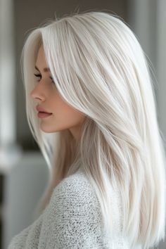 23 Gorgeous Winter Hair Color Ideas For Blondes Medium Ice Blonde Hair, Blonde Christmas Hair, Icy Vanilla Blonde Hair, Dark Roots Icy Blonde Hair, Long Ice Blonde Hair, Light Platinum Blonde Hair, Layered Platinum Blonde Hair, White Blonde Long Hair, Shoulder Length Platinum Blonde Hair