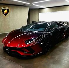 a red sports car parked in a garage