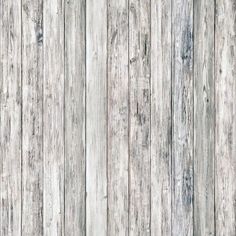 an old wooden wall with white paint and wood grains on the boards, as if it were painted in gray