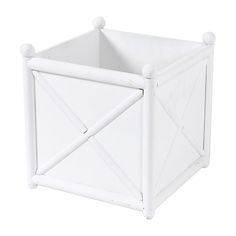 a white storage box with two handles on each side and an opening at the top