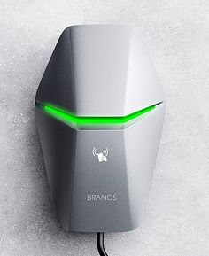 a wall mounted device with a green light on it's side and the words brands above it