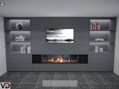 an empty room with a fire place in the center and bookshelves on either side