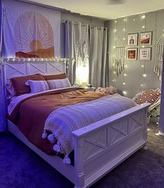 a bedroom with purple carpet and lights on the walls