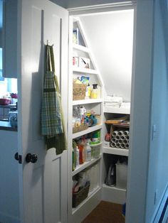 an open pantry door in a house