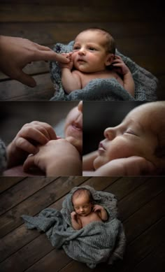 a baby laying on top of a wooden floor next to his mother's hand