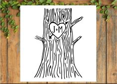 a drawing of a tree with a heart in the middle and initials on it's bark