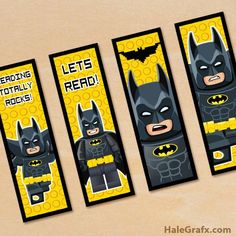 three batman bookmarks with the words let's play read written in black and yellow