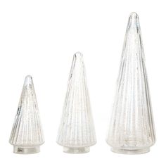 three clear glass vases sitting next to each other