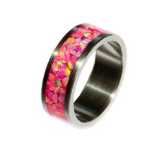 "Details   All rings were handcrafted with individually selected and hand placed opal stones and then sealed with epoxy resin.  - Made to order  Ring width: 6mm  Inlay channel 4mm  Pink Opal  This titanium ring inlaid with Pink Synthetic Opal has a charming pink base tone that reflects the captured light in shades of pink and soft green. The color pink symbolizes love, tenderness, sweetness and femininity. Pink opal is also said to have the ability to heal emotional wounds and dispel fear or wor Modern Pink Rings With Polished Finish, Opal Inlay Ring Gift, Gift Opal Inlay Ring, Opal Ring With Inlay Perfect For Gifts, Pink Rings With Polished Finish For Gift, Titanium Ring, Hard Metal, Synthetic Opal, Special Ring