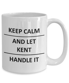 a white coffee mug with the words keep calm and let kimbery handle it